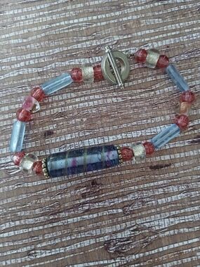 Handcrafted Multicolor Glass Bead Bracelet with Coral Accents